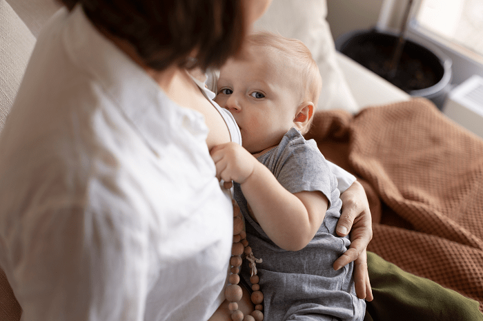 mother-breast-feeding-her-baby-freepik